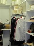 Wonderful Women's closet filled with clothing, shoes, purses, and other accessories