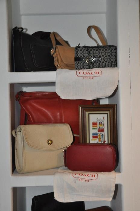 Many Coach purses and accessories