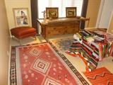 Native American, Mexican and Turkish Kilim weavings with early 20th century hand made work bench.