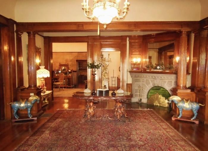 Grand Entry Hall with a Pair of Monumental Cloisonné and Gilt-Metal Stallions, an Antique German Carved & Inlaid Center Table on a Palace Size 1920s American Persian-Style Carpet
