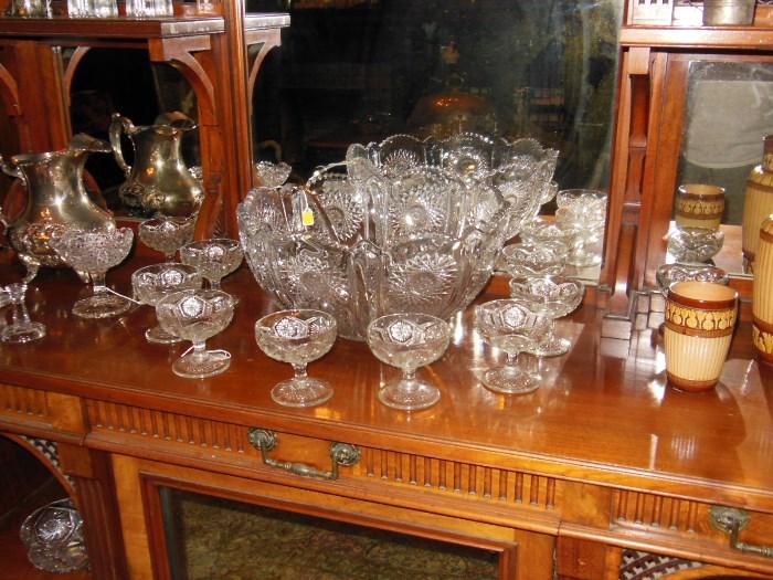 An Antique Crystal Punch Bowl with Footed Cups; and a Silver-plated Water Pitcher from the Rothschild Family