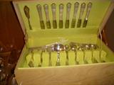 Silverplate flatware set with "R" monogram