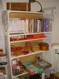 Sewing items.  Top shelf of books also holds set of programs for the Husqvarna Viking programmable machine (books are included with machine and are not for sale separately)