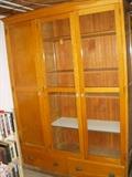 Oak storage and display cabinet salvaged from a Muskegon school