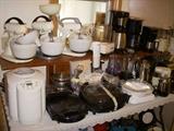 Many kitchen appliances.  This is just a sampling.  There are over a dozen coffee makers....all work!