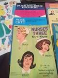 Very nice paper doll collection. Some of these date from the 1950/60s (The Disney and nurse paper dolls) and some are newer. Some are in brand new, unused condition. The felt dolls are an unusual find! All items are in good condition.