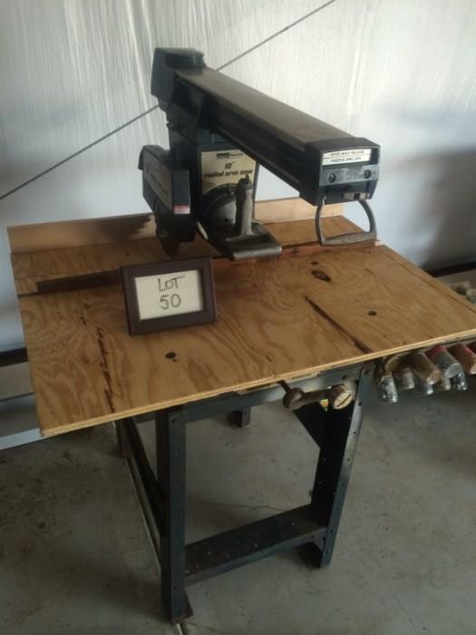 Very nice Montgomery Ward radial arm saw with pistol grip. Unit was very dirty but cleaned up really nice. All features seem to work, it is missing some of the indicator pointers for degree and angle setting but can easily be added. Has a new wooden table top as well as a new back stop. The backstop will need to have the guide cut out to complete it. (old stop is currently installed) The saw will need to have a new blade as it is VERY dull. Overall condition is nice and functional.
