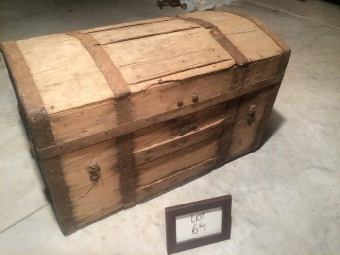 Antique wooden trunk. Old and weathered, this thing has history! Overall condition is poor.
