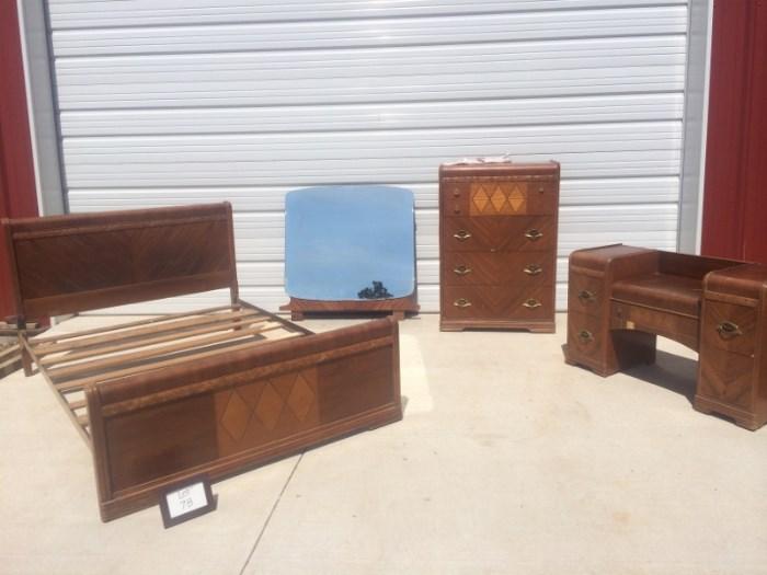 This older bedroom set really has character. It is a full size bed with dresser, desk and mirror. This set is used and not perfect but really does look nice. With a little work on the veneer and some repair on one leg of the headboard it could be really nice. No Reserve so don’t miss out on this one!!
