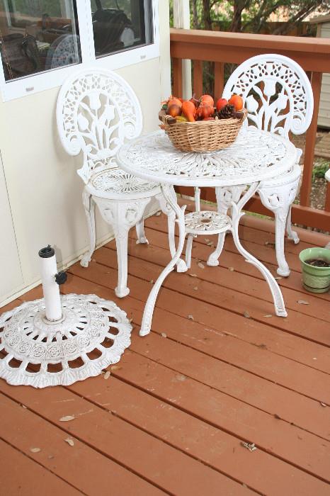 Outdoor cast iron table and 2 chairs