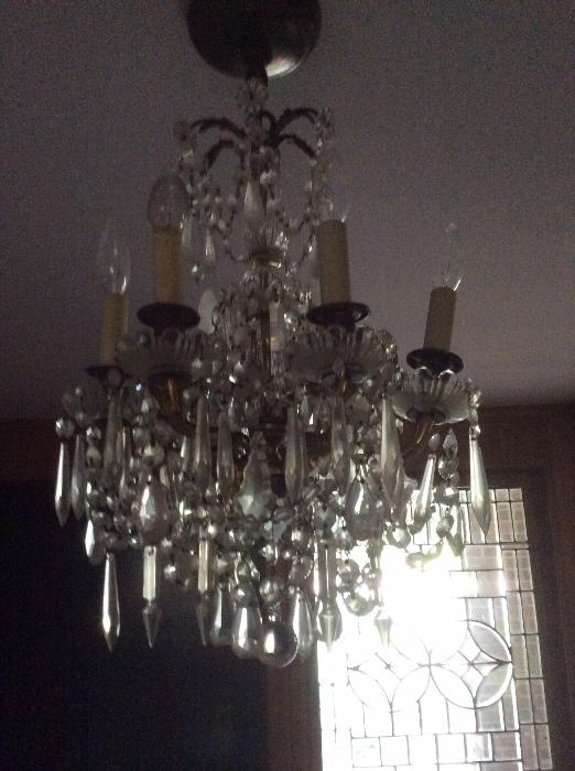 One of two small chandeliers with old prisms. Great look. 