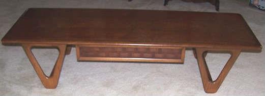 has matching end table  40" by 30"