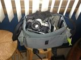 Canon AE-1 Program camera, one-touch automatic macro zoom lens, Yashica ST-7 tripod, Quantaray Q15 flash, 5 rolls unused Fujicolor 200 prints and other accessories
