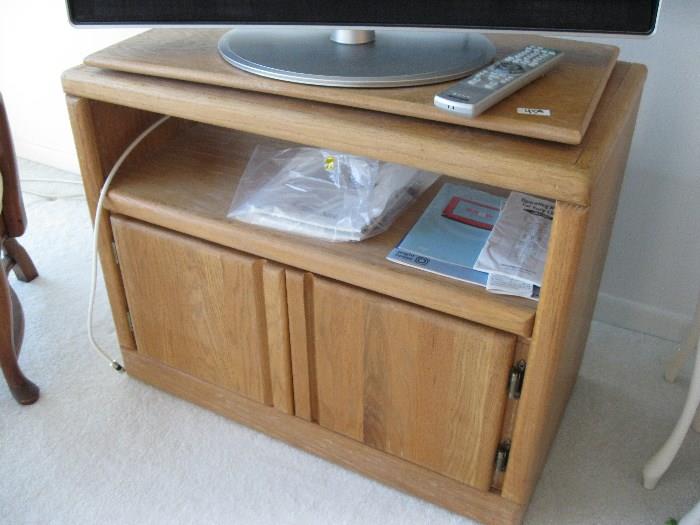 TV stand with a lazy susan on top