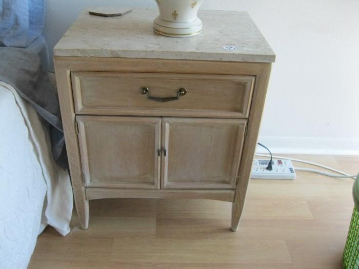 pair of marble top side tables