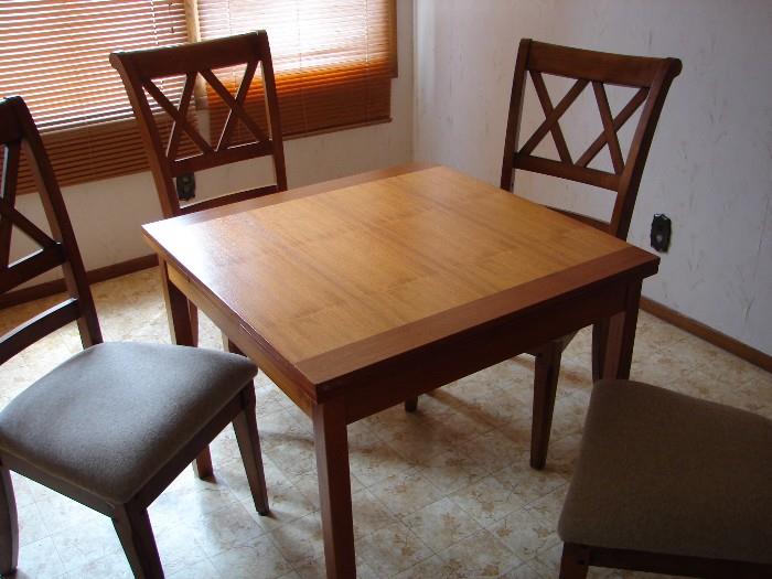 Teak kitchen table with self-storing leaves stowed!