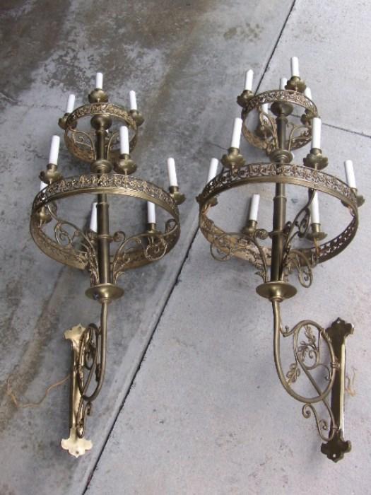 outstanding pair of brass wall chandliers