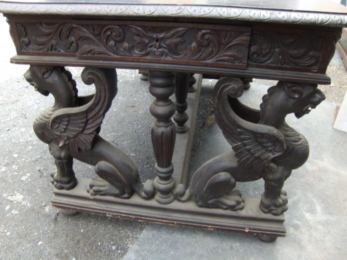 Horner 3 drawer library table with winged griffins