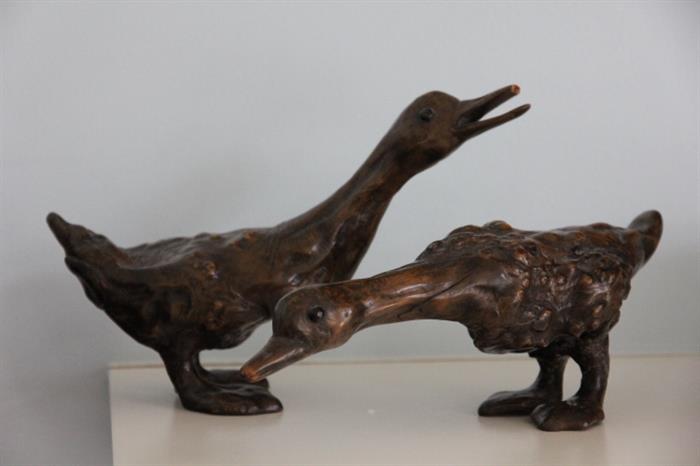 Carved wood duck figurines