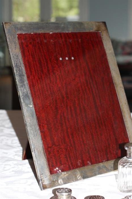 Wonderful large sterling silver picture frame with mahogany backing.
