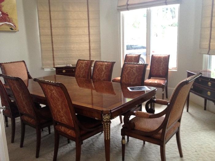Stunning Karges dining table with gold leaf and 10 chairs with Scalmandre silk fabric
