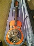 Dobro guitar with humidor case