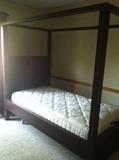 Twin dark wood poster bed