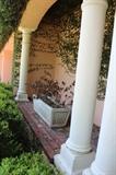 decorative columns and planter with landscaping