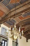 European imported inlaid ceiling with solid wood beams and wrought iron decorative pieces