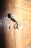 original 1920's solid wood door with door knob and key hole