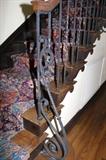 original staircase with oak banister and wrought iron 