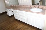 bathroom cabinets, sink. marble counter tops 