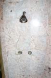 marble shower with fixtures