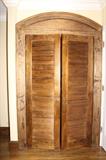 full louvered wooden closet doors with frame