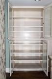 kitchen built in shelves with glass doors for display