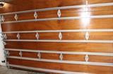 mahogany hurricane rated double garage doors with openers set of two 