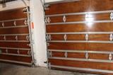 mahogany hurricane rated double garage doors with openers set of two 