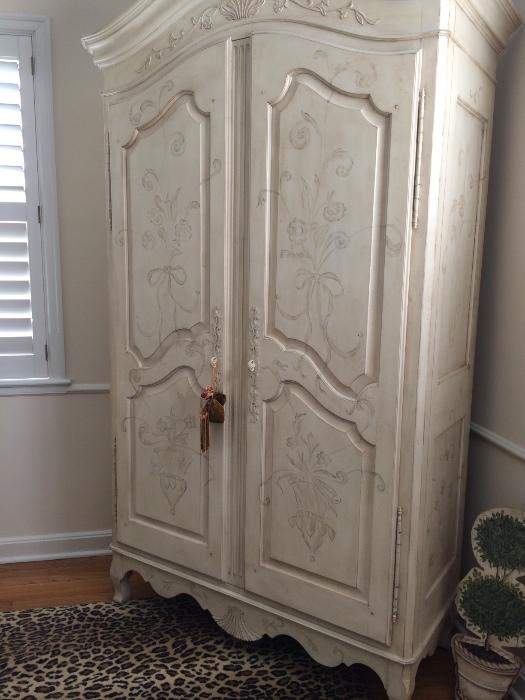 Ethan Allen armoire. Notice the detail painting. Retail value: $4,000. Receipt: $2499. Rug not available.