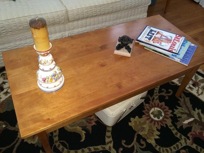 Coffee table. Portugal pottery candlestick.