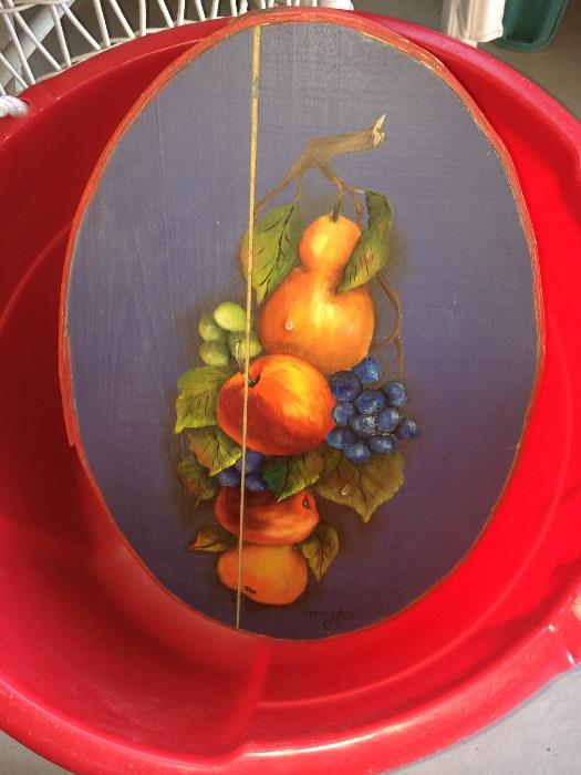 Painted top of oval primitive box.