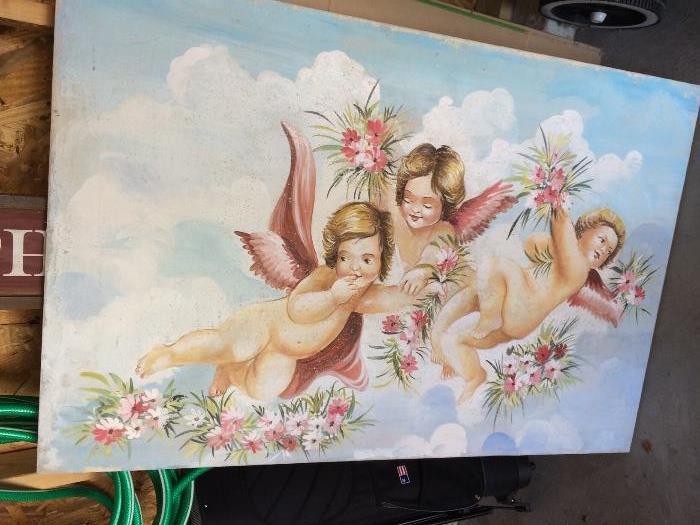 Very large art piece of 3 cherubs.