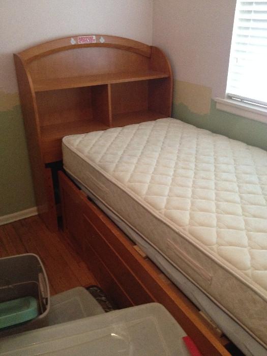2 Twin matching beds, one with new mattress, storage drawers underneath