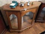 Low display cabinet with glass doors (cars not available at this sale)