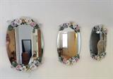 Mirrors with flower decor