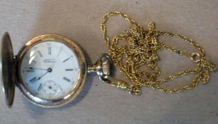 key wind coin silver pocket watch