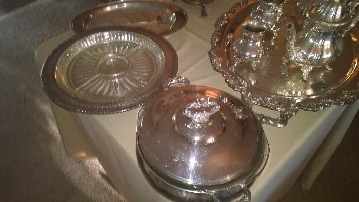silver plate-covered casserole, lazy susan with glass insert, coffee and tea set