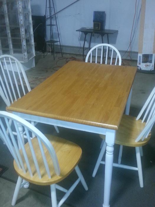 DINETTE AND FOUR CHAIRS SET.