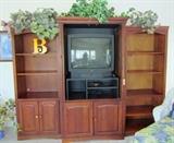 Cabinet with doors recessed.