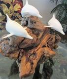 Large with three dolphins.