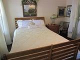 Queen size bed with wood frame